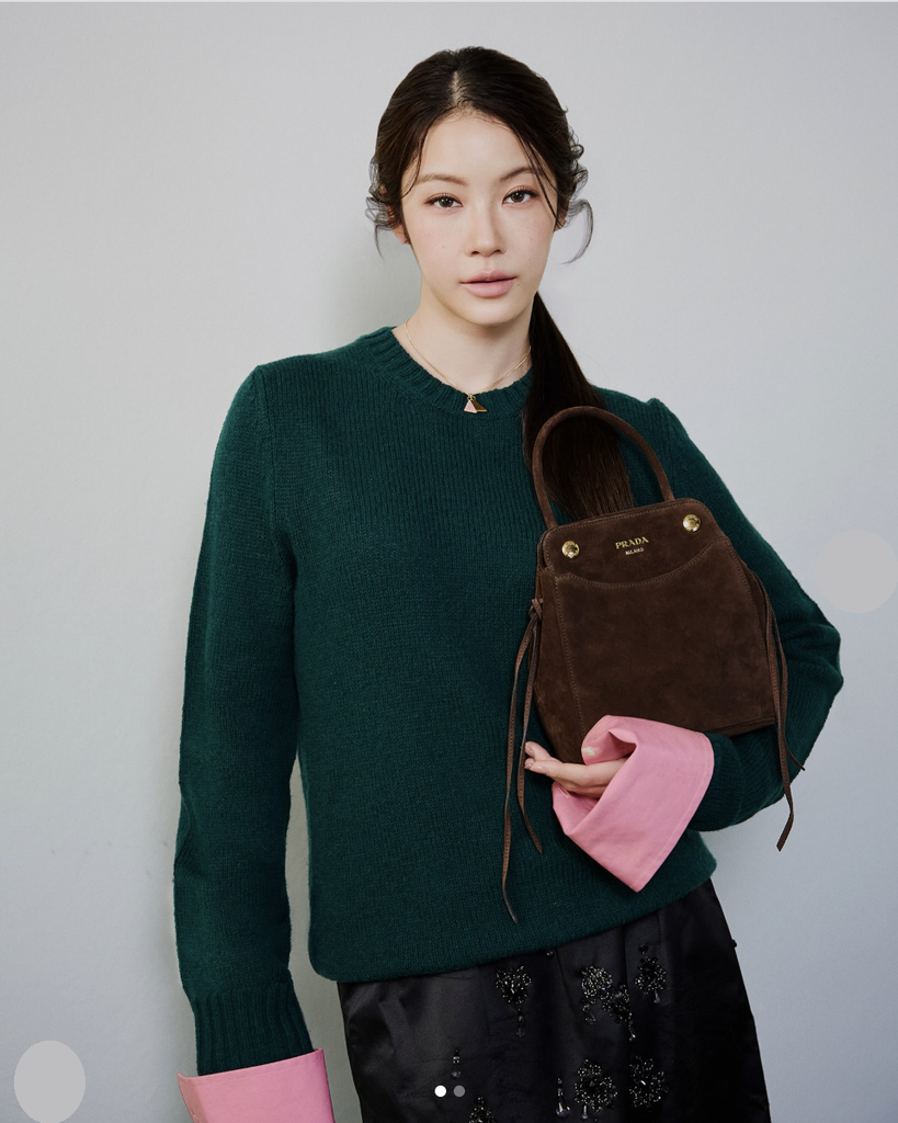 Namtan Tipnaree wears the Prada Carry for her ambassador announcement shot.
